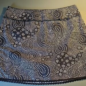 The Limited Black A-Line Mini Skirt Paisley Print. Limeted Stretch Size 4.